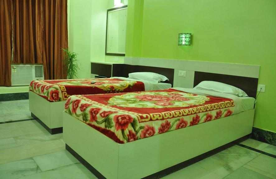 Hotel Kiran Palace Varanasi Rum bild