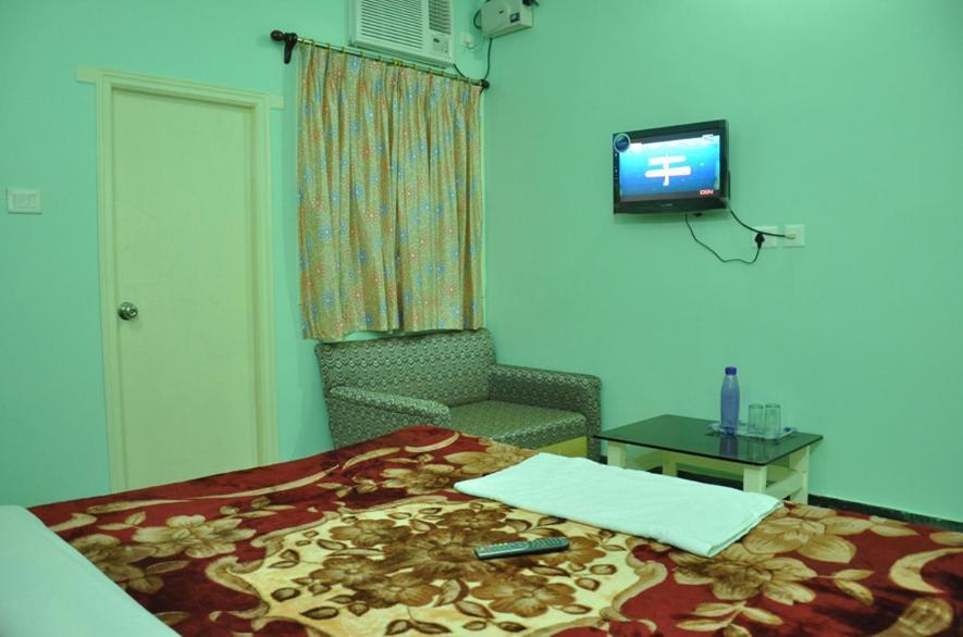 Hotel Kiran Palace Varanasi Rum bild